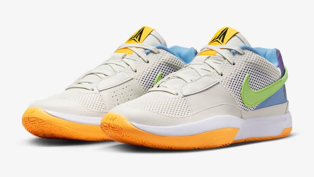 Side view of Ja Morant's white and yellow Nike shoes.